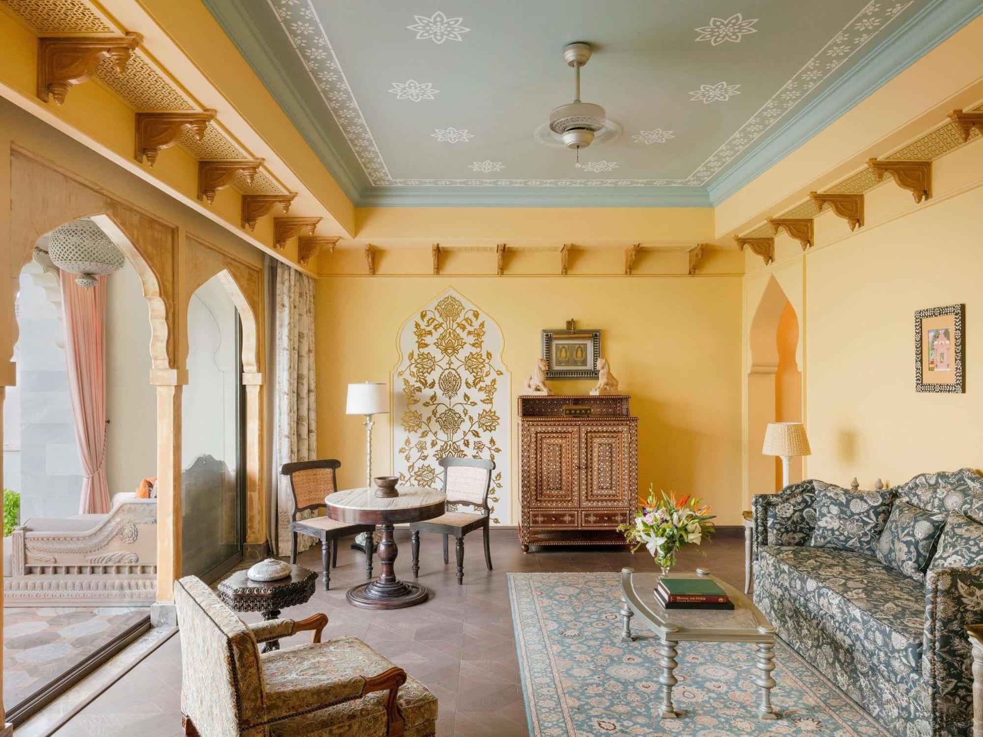Maharani One King Bedroom Royal Suite with Pool: Airport Transfers in luxury vehicle, 01 Bottle of wine, INR 5000 hotel credit once during the stay. One 60-minute couple spa therapy. Evening Hi-Tea / Sundowner with Bartender, Butler Service